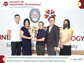 Assistant Professor Rujipun Phangchandha
in order to congratulate her on the
occasion that the SSRU Council has an
unanimous resolution to appoint her a
higher academic position