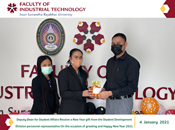 Deputy Dean for Student Affairs Receive
a New Year gift from the Student
Development Division personnel
representative On the occasion of
greeting and Happy New Year 2021